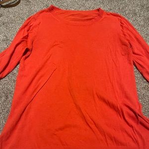 Orange top lightly worn
